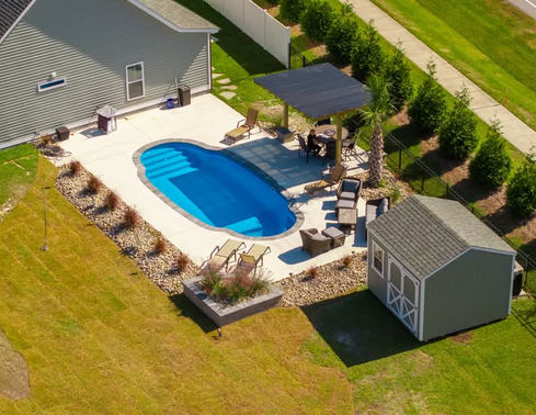 Aerial view of Pompano Beach fiberglass pool installation in Virginia Beach VA