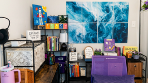 Kelly Sutherland's home recording studio featuring ocean-inspired sound panels, purple accent chair, educator bookshelves with teaching resources, and motivational signs including "Dreams Don't Work Unless You Do" — Learning in a Distracted World