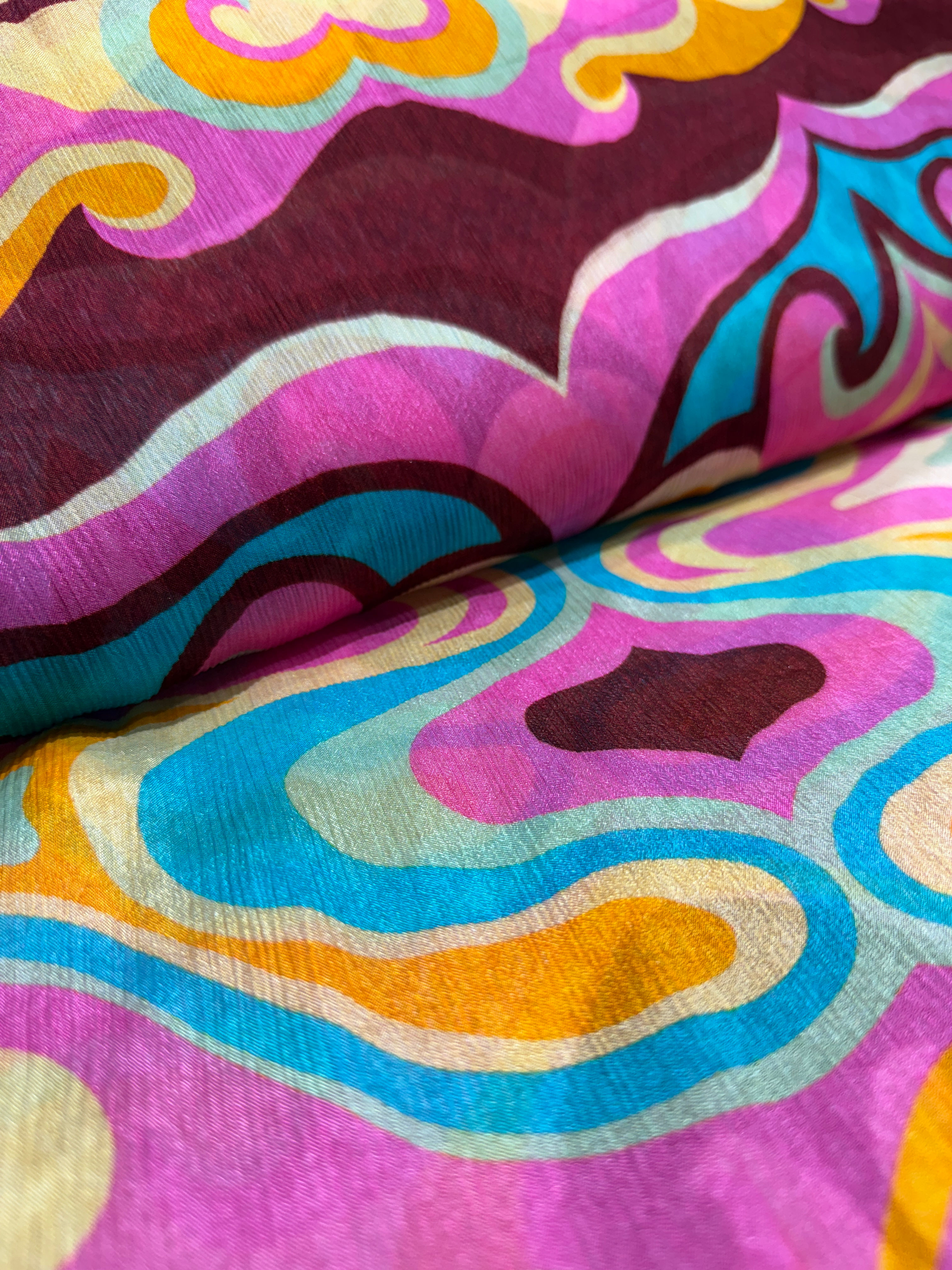 Vibrant Psychedelic Swirl Printed Satin Crepe Fabric in Magenta Teal and Gold