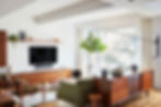 A living room with some wirless Sonos speakers on display