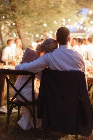 couple embracing during their wedding reception at the wayback in austin texas