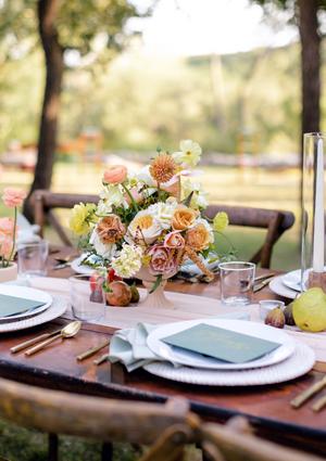 Wedding reception table with floral centerpieces at The Wayback in Austin Texas