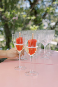 cocktails with popsicles in them for a corporate event at the wayback