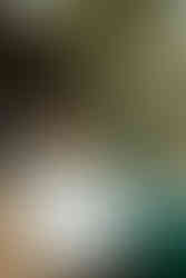 A girl wearing a Polo Ralph Lauren sweater over her shoulders