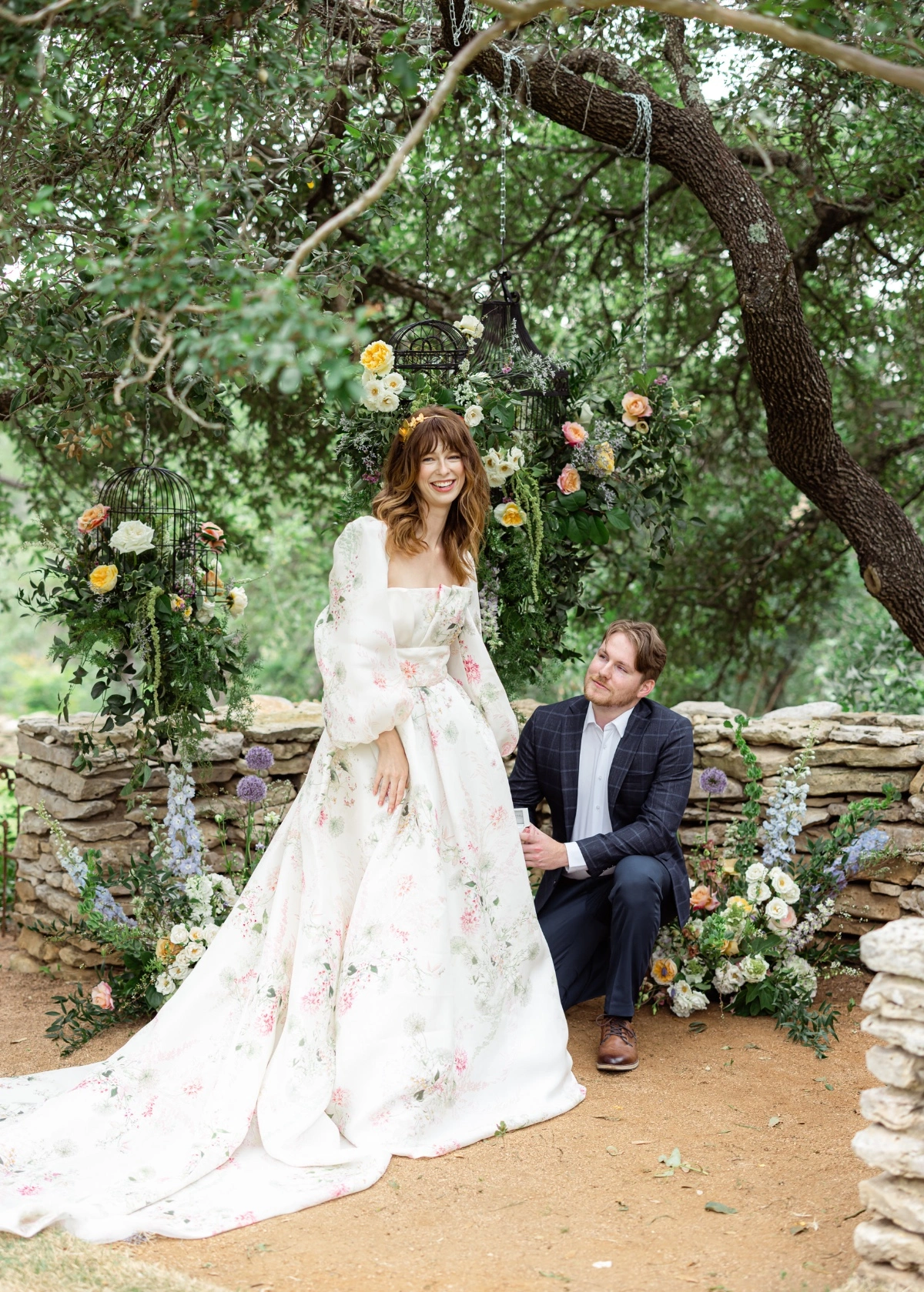 Bridal model surrounded by florals in a Monique Lhuillier dress surprise proposal at The Wayback in Austin Texas 