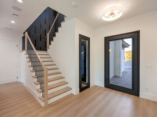 The Messina by Trust Home Builders: entry and staircase