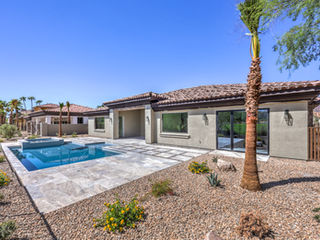 The Trentino by Trust Home Builders: rear exterior and pool