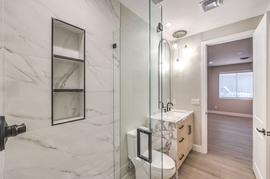 Secondary bathroom with modern finishes in a custom home by Trust Home Builders in Northwest Las Vegas, Nevada