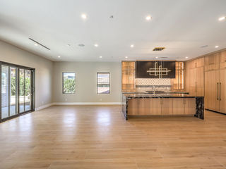 The Hampton by Trust Home Builders: great room and kitchen