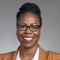 A black woman teacher headshot.jpg