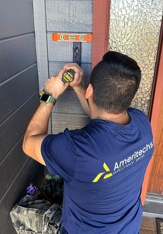 Technician installing security camera for a home in san diego