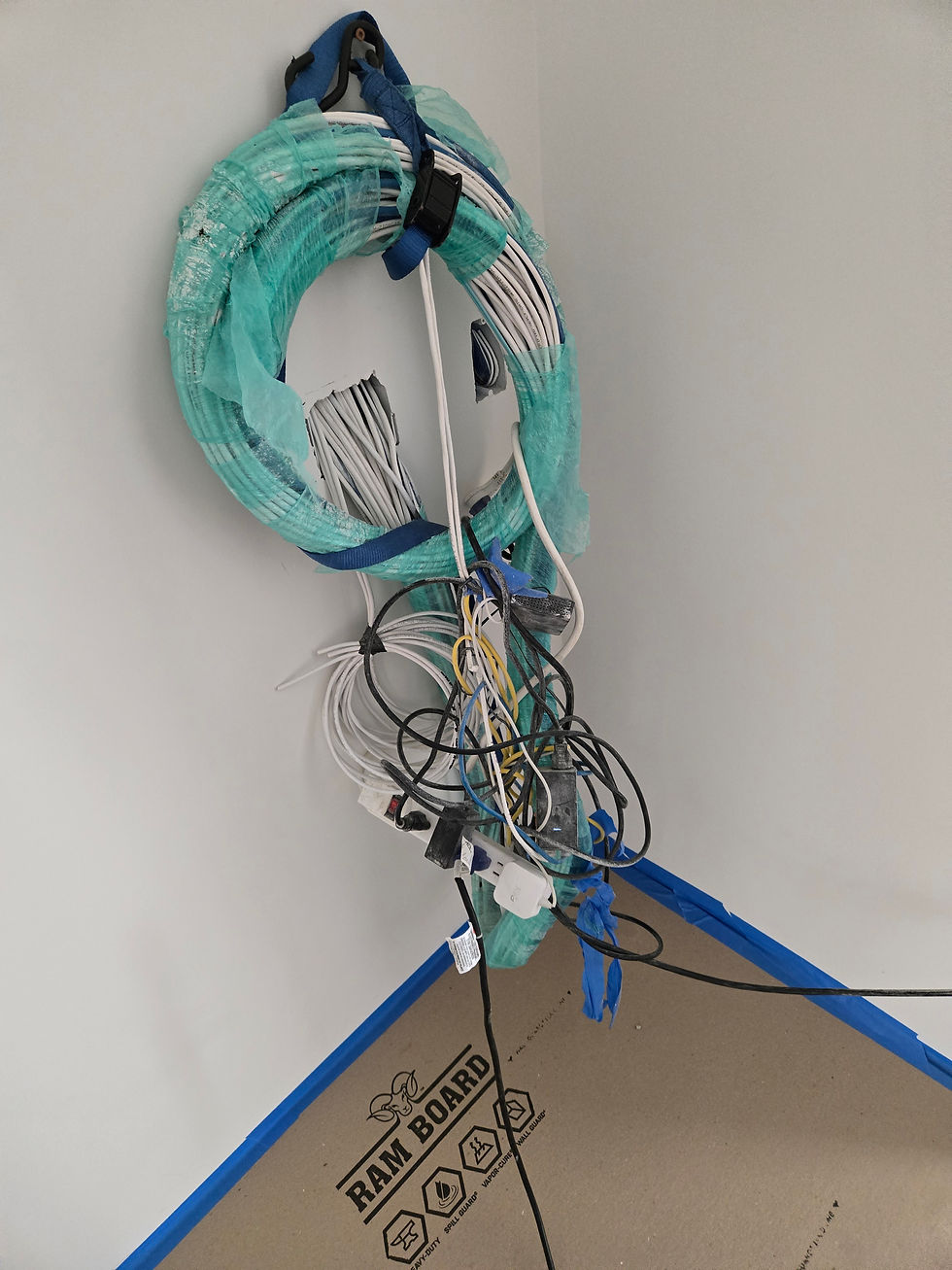 Bundle of low-voltage prewire cables organized for a new construction smart home installation