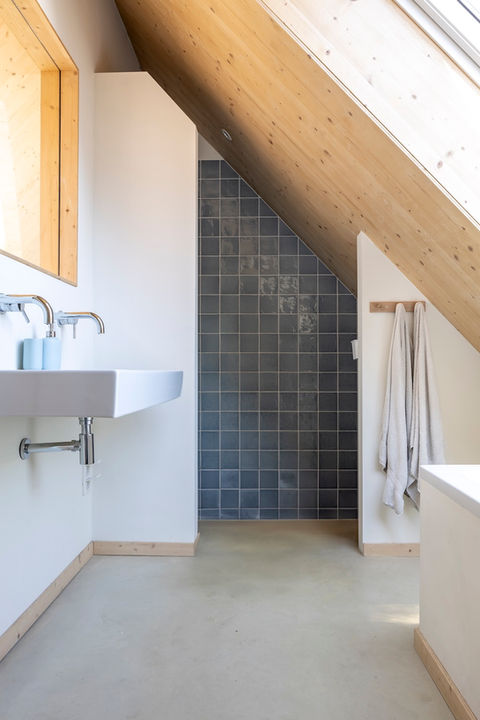 duurzame woning badkamer douche tegels