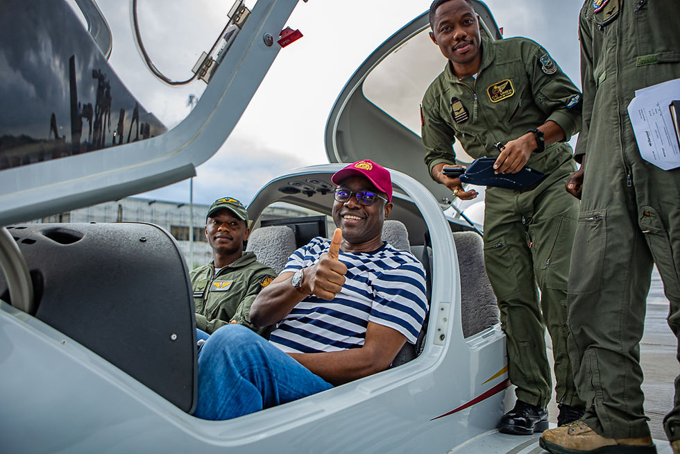 Governor Seyi Makinde of Oyo State gives a thumbs-up while seated in the cockpit of one of the newly delivered Diamond DA42 MNG surveillance aircraft, flanked by Nigerian Air Force flight crew members at Samuel Ladoke Akintola Airport, Ibadan.