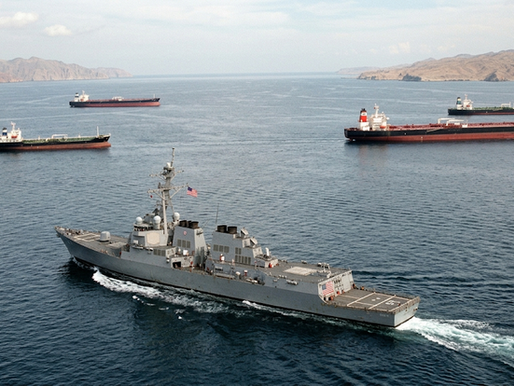 U.S. Navy warship enforcing blockade in the Strait of Hormuz as global oil shipping routes face disruption amid the U.S.-Iran war.