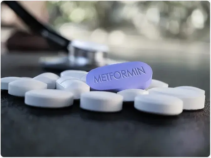 Close-up view of a colorful pill organizer