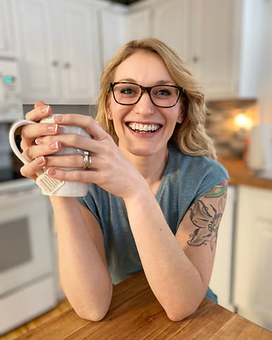 woman smiling with coffee