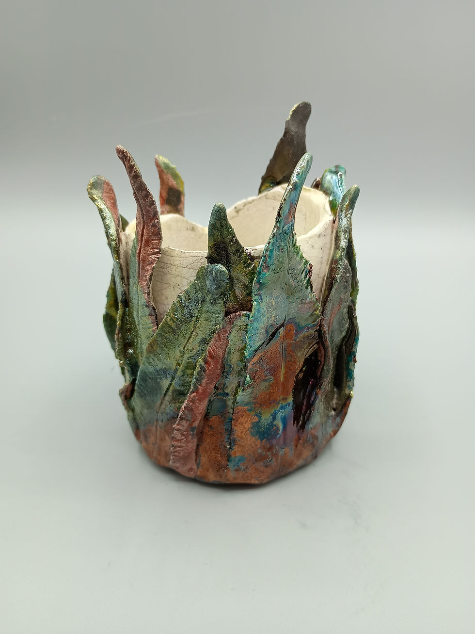 Sea Kale Tealight from the Raku collection Raku glazed and fired Sea Kale tealight holder.