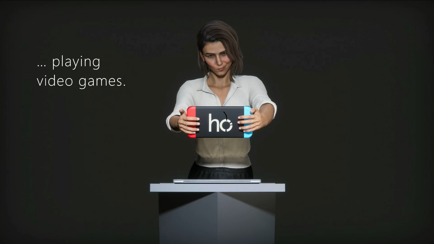 Woman playing video games with a hci console on a desk.