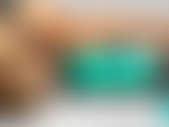 Lady releasing her fascia with a massage ball