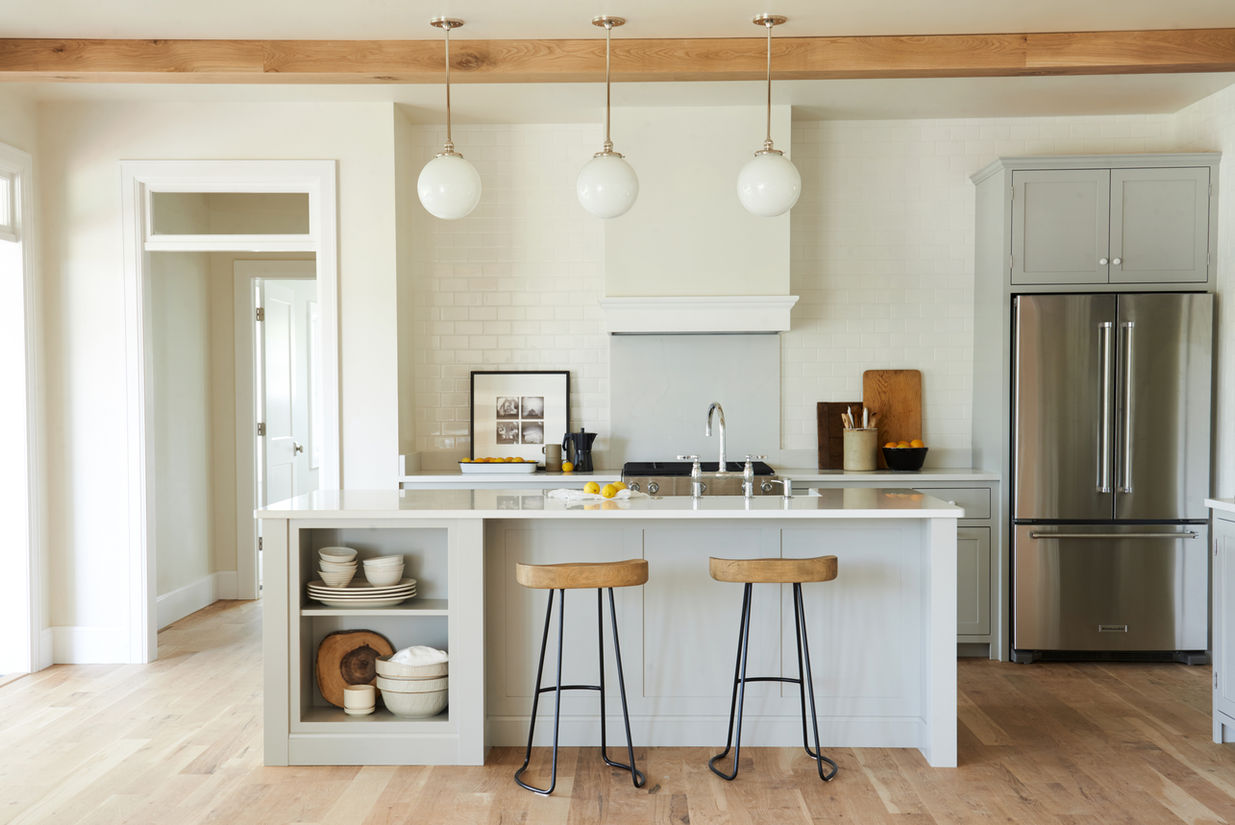 professionally installed custom kitchen cabinets with island and integrated storage