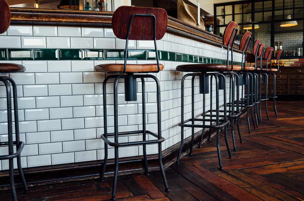 Bar stools at at a restaurant.