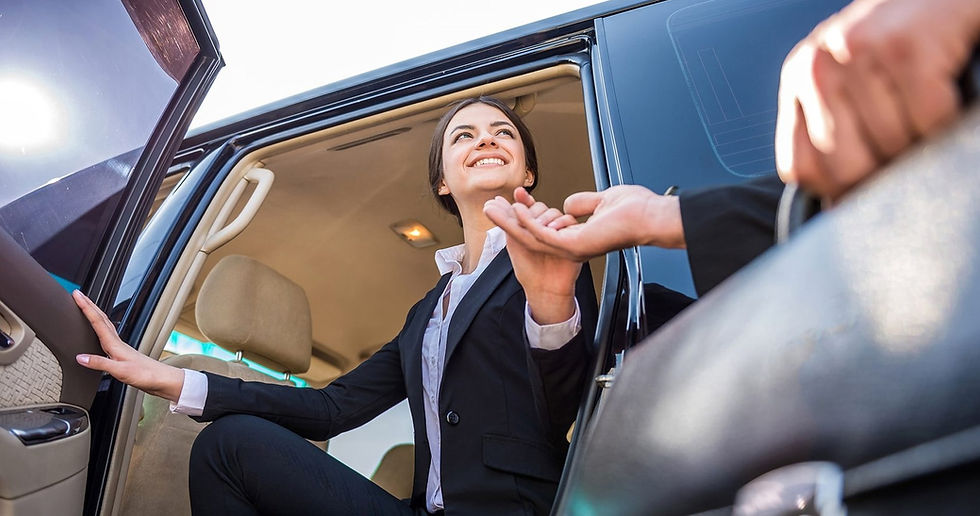 Chauffeur greeting international patient on arrival for medical treatment in the UK, part of Willenhall Group’s coordinated travel, accommodation, and recovery support.