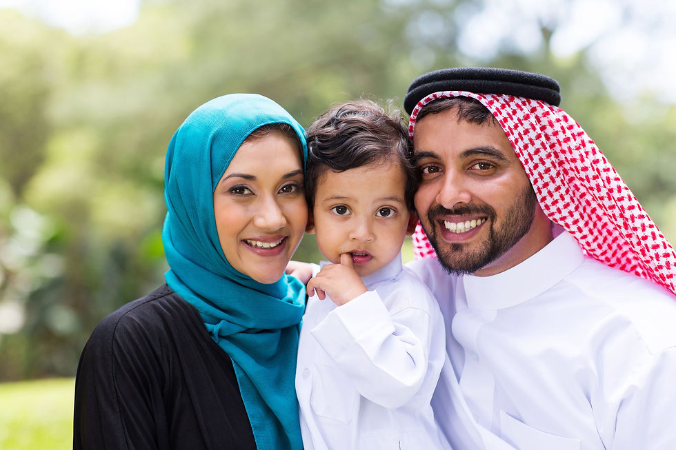 Smiling Middle Eastern family with young child, representing Willenhall Group’s commitment to culturally respectful partnerships and integrity in international patient care.