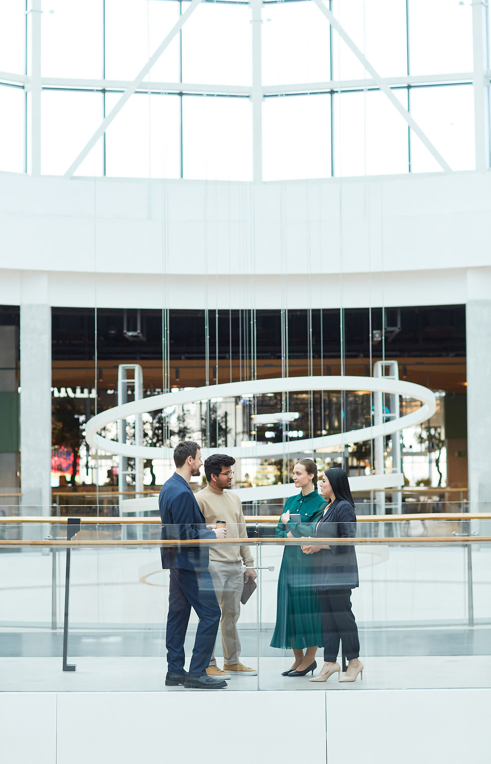 business-people-in-modern-glass-building-wide-angl-2026-01-08-06-10-19-utc.jpg
