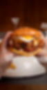 Cheese burger in hand
