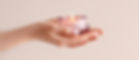 Woman holding burning candle on white background_edited.jpg
