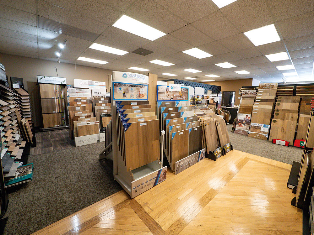 display of hardwood, laminate, and vinyl flooring samples
