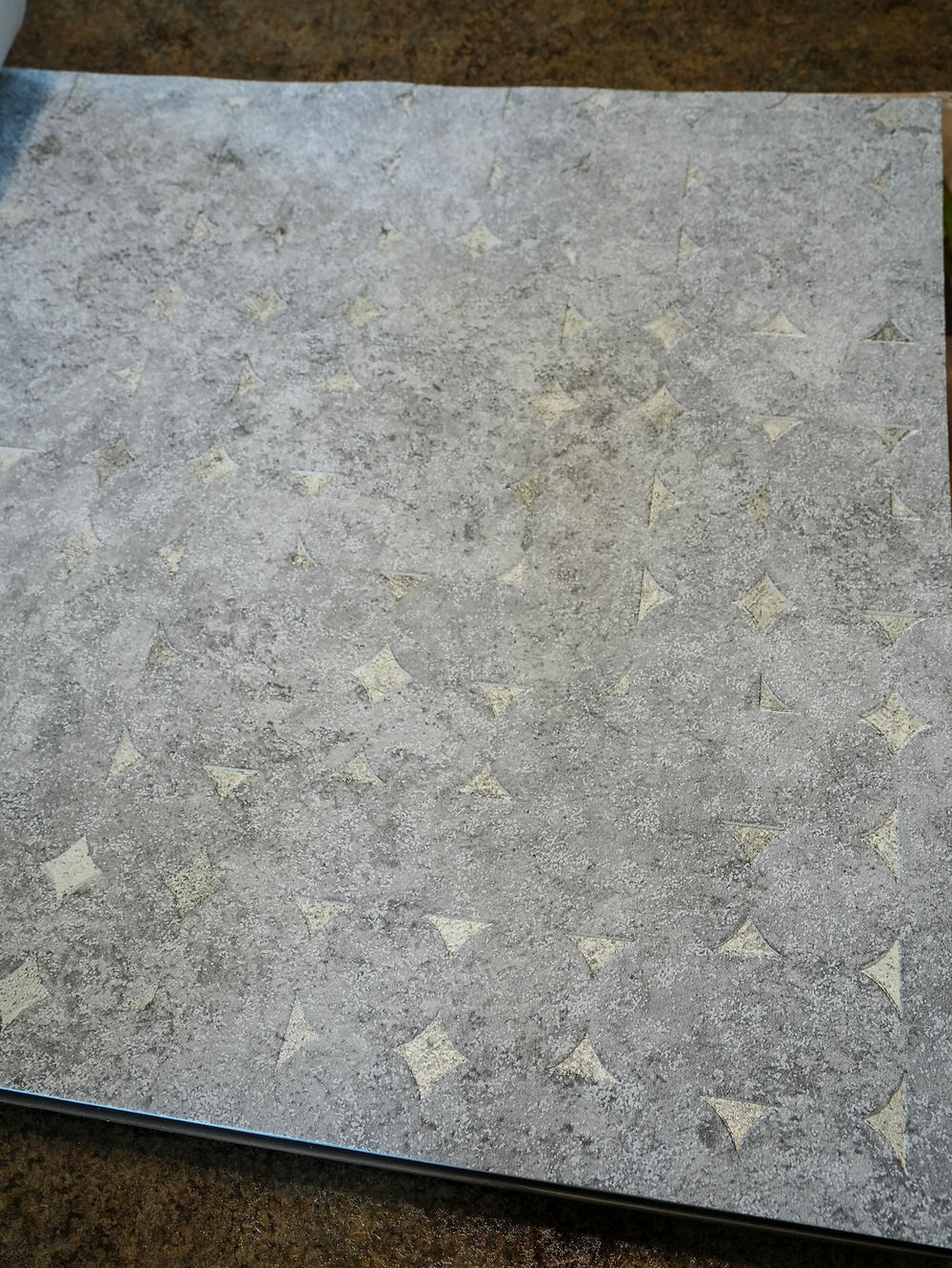 light blue textured wallpaper sample