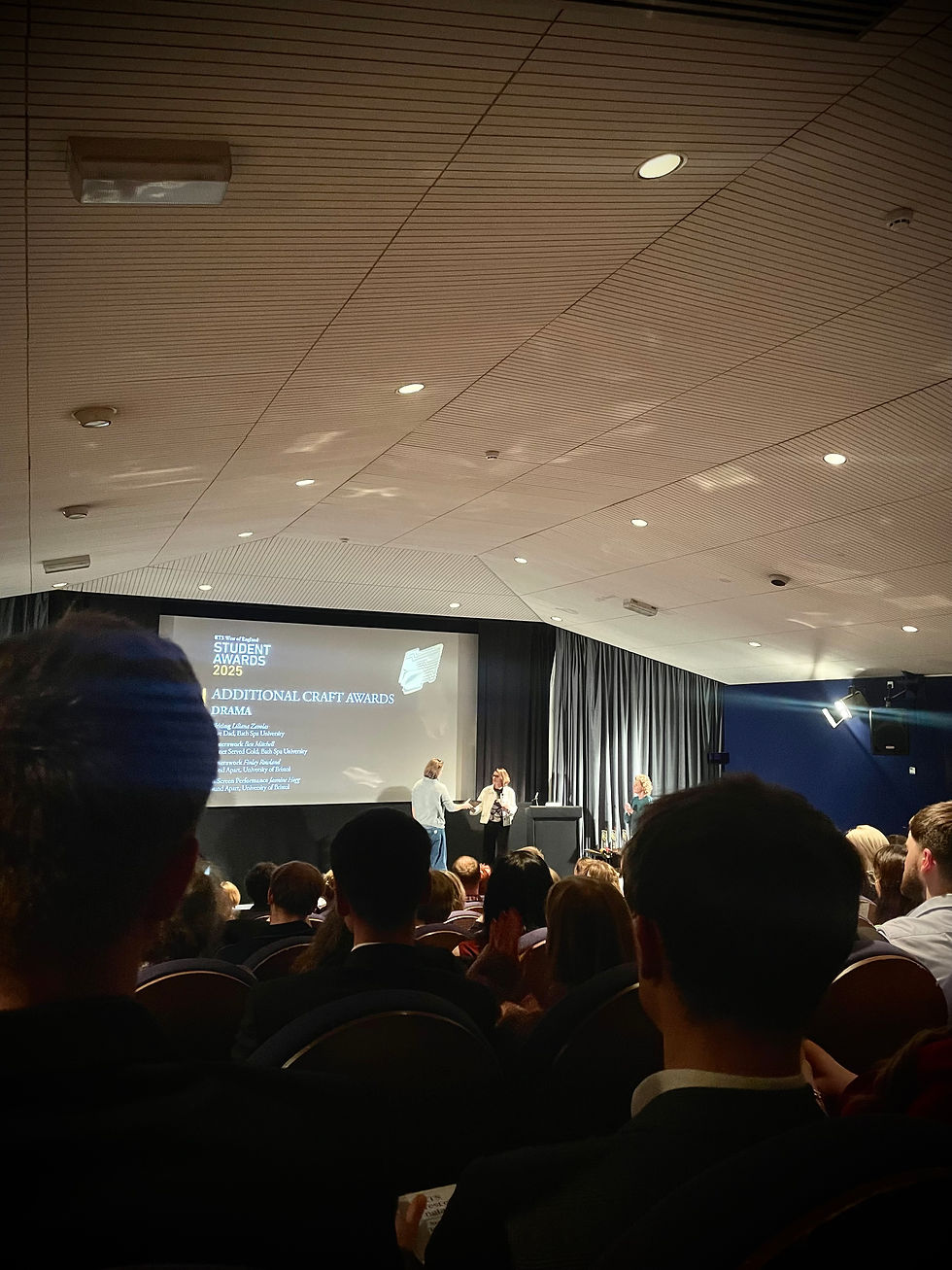 Fin Rowland receiving awards from the Royal Television Society for his film Bound Apart.