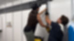 Nadia George fitting a pipe in a custom water treatment plant