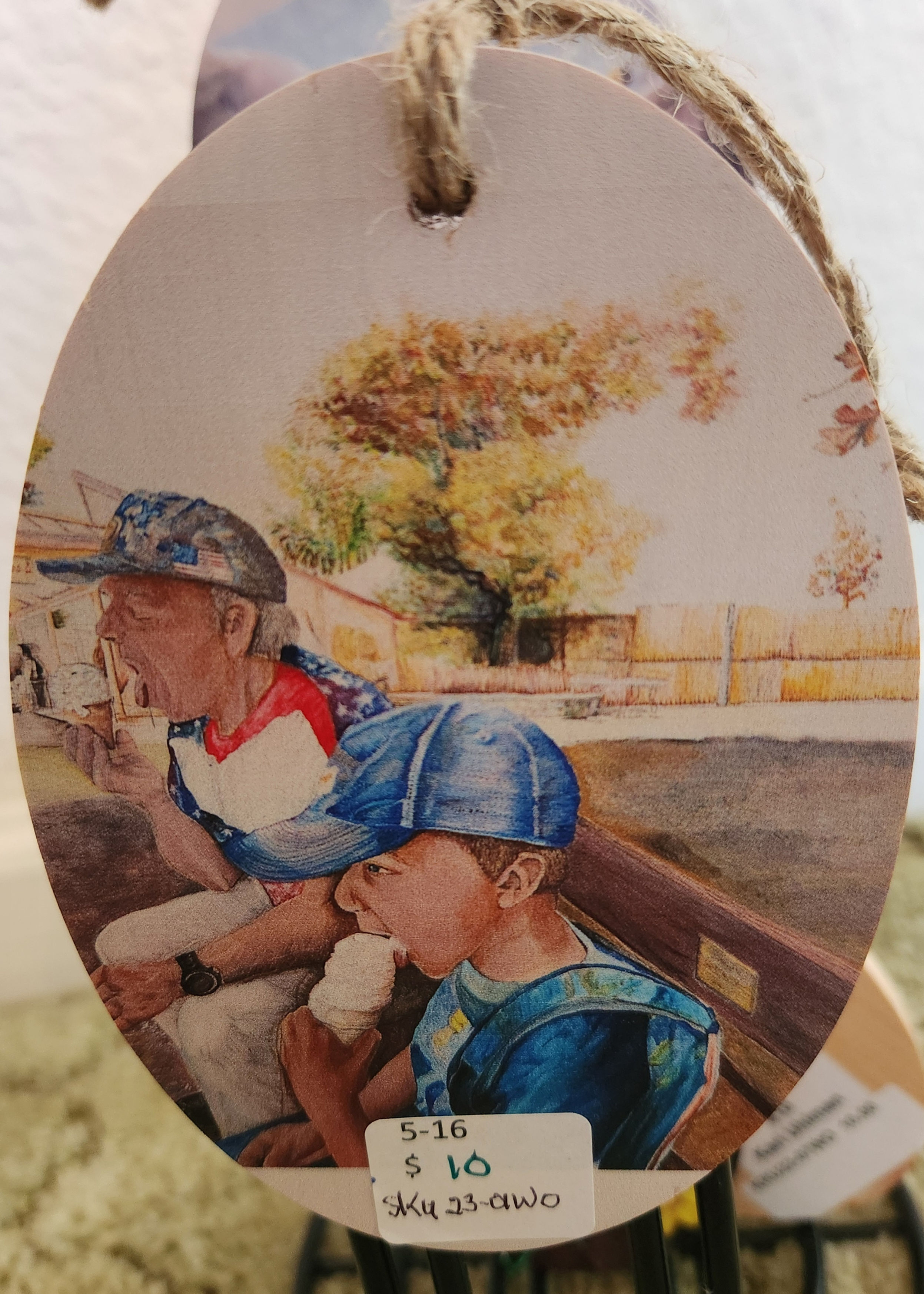 4" OVAL WOODEN ORNAMENT WITH A MAGNET ON THE BACK