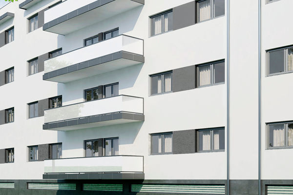 Fachada do Edifício Universitas com varandas em vidro, fachadas brancas e detalhes em cinza.