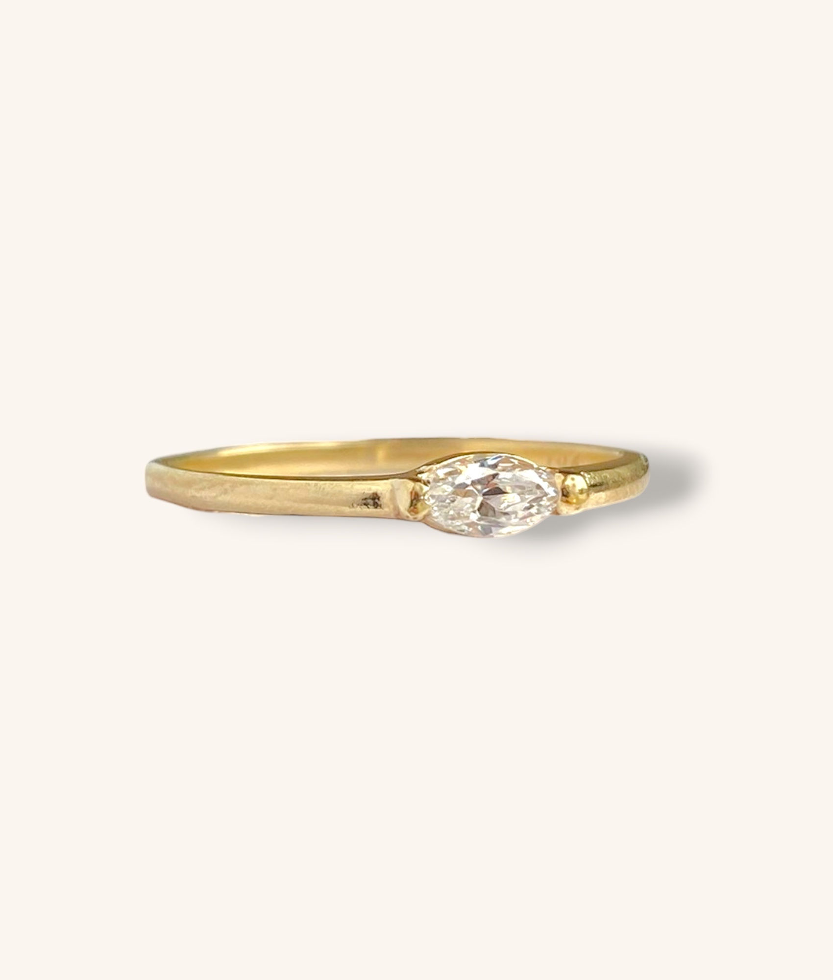 10K YELLOW GOLD CZ MARQUISE CUT RING - H