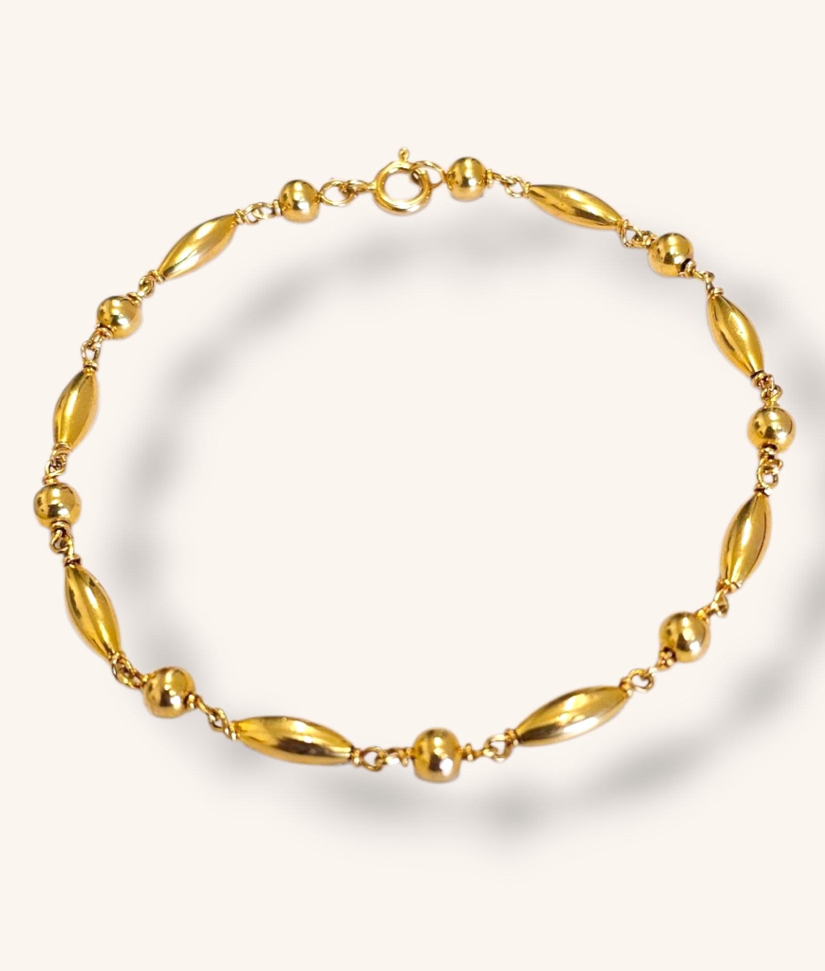 18K YELLOW GOLD ROUND & MARQUISE SHAPE LINK BRACELET - 01043J