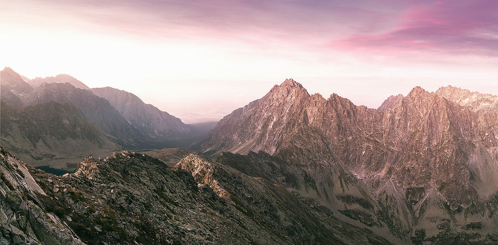 landscape photography of mountain ranges under purple and pink skies_edited_edited.jpg