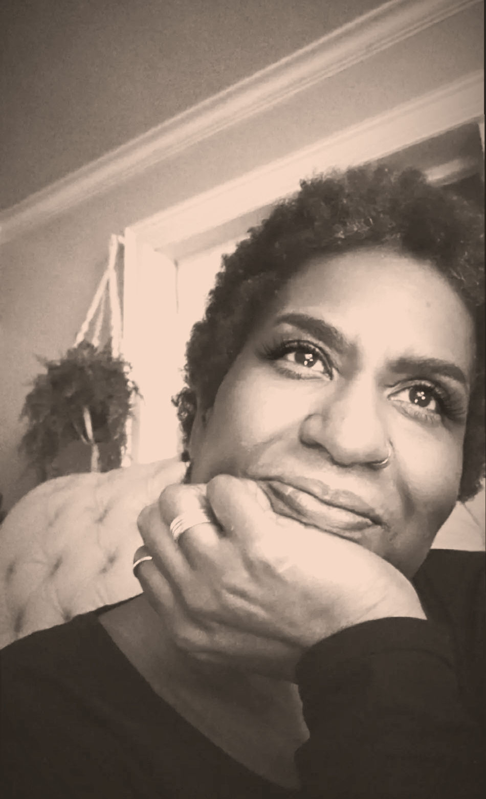 Black woman strategist for Black empowerment orgs thinking.