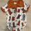 Thumbnail: Orange Cowboy Boot Collared Onesie