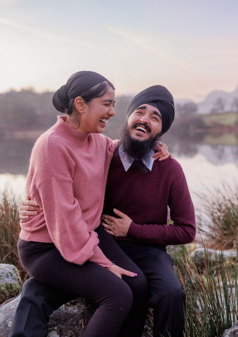 Couple laugh following proposal in Lake District