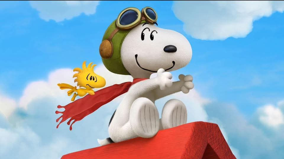 Snoopy/woodstock flying on dog house