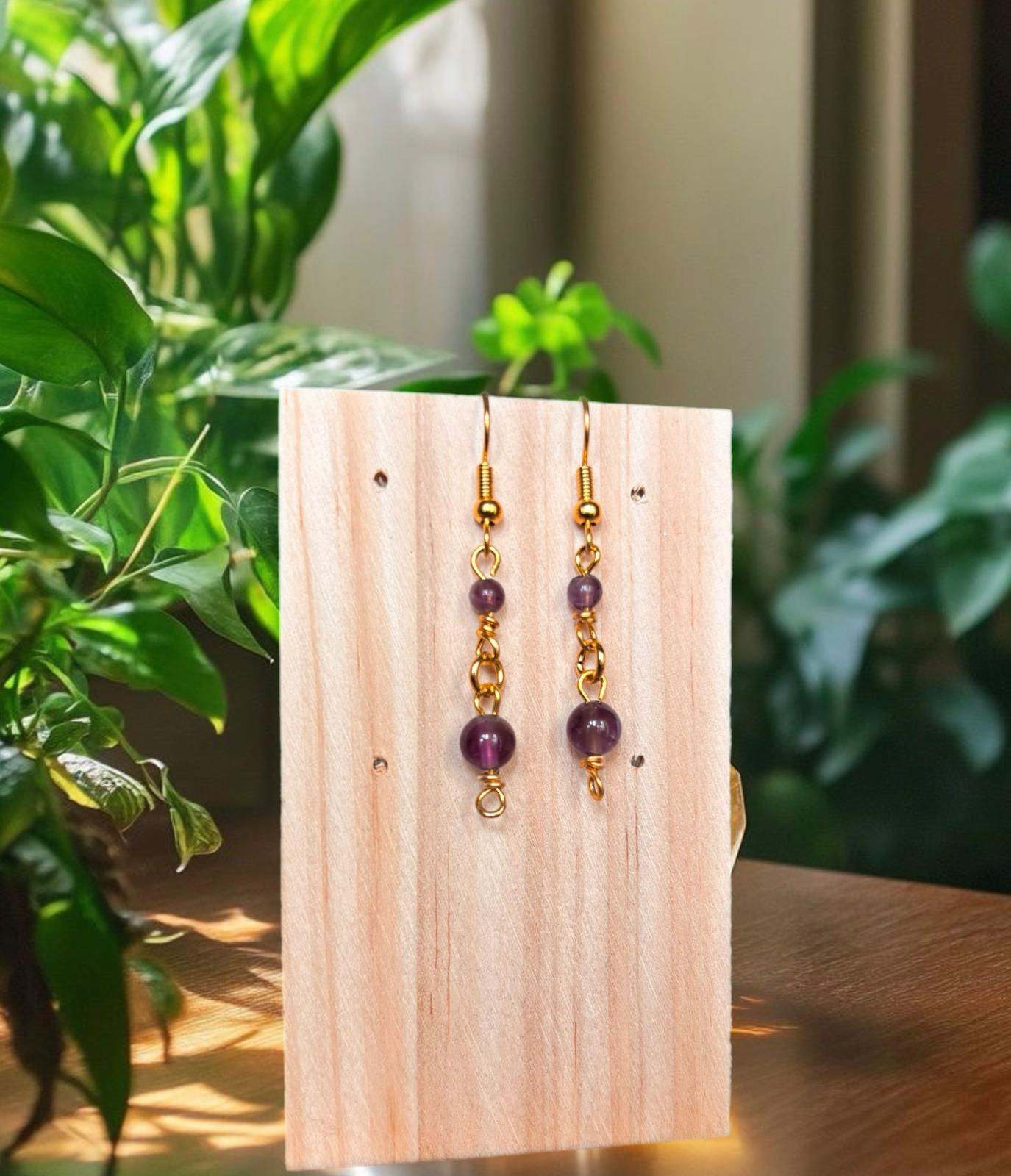 NYX – Boucles d’Oreilles Améthyste