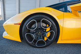 Interior view of yellow Lamborghini Huracan rental