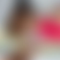 Children sitting at desks in school writing