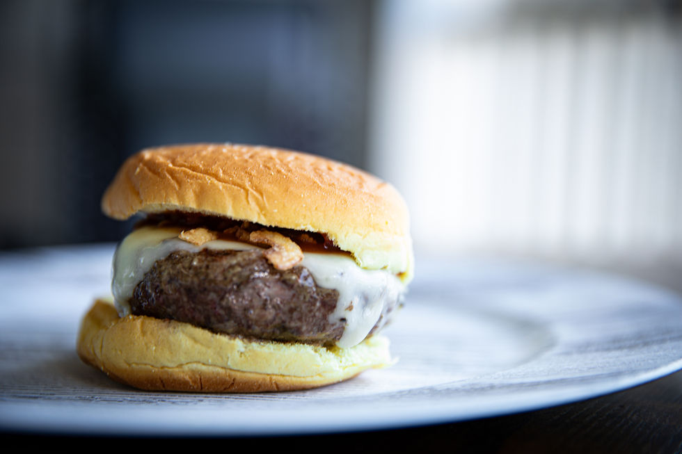 Eye-level view of a beautifully plated dish in a restaurant setting