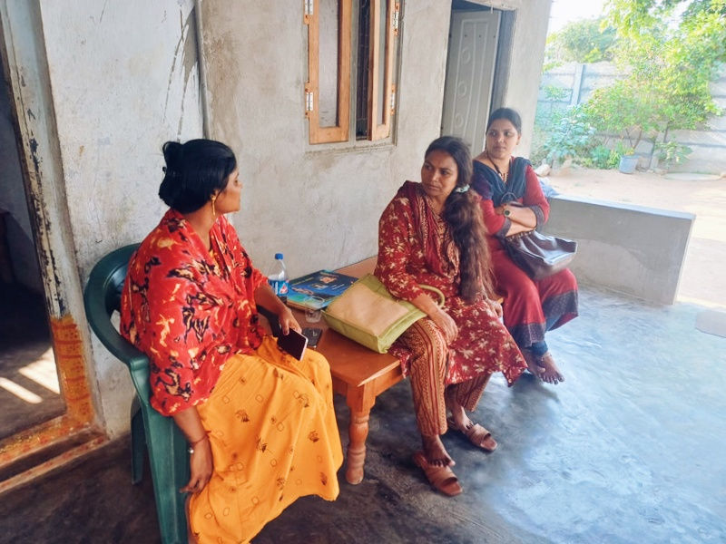Shanu (left) with Smita and the volunteer