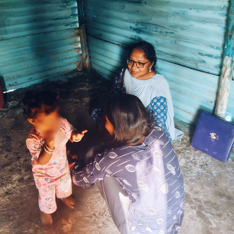 Keona and baby with social worker